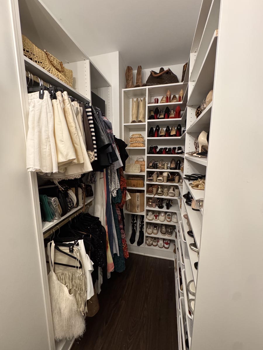 narrow-walk-in-closet-shoe-shelves